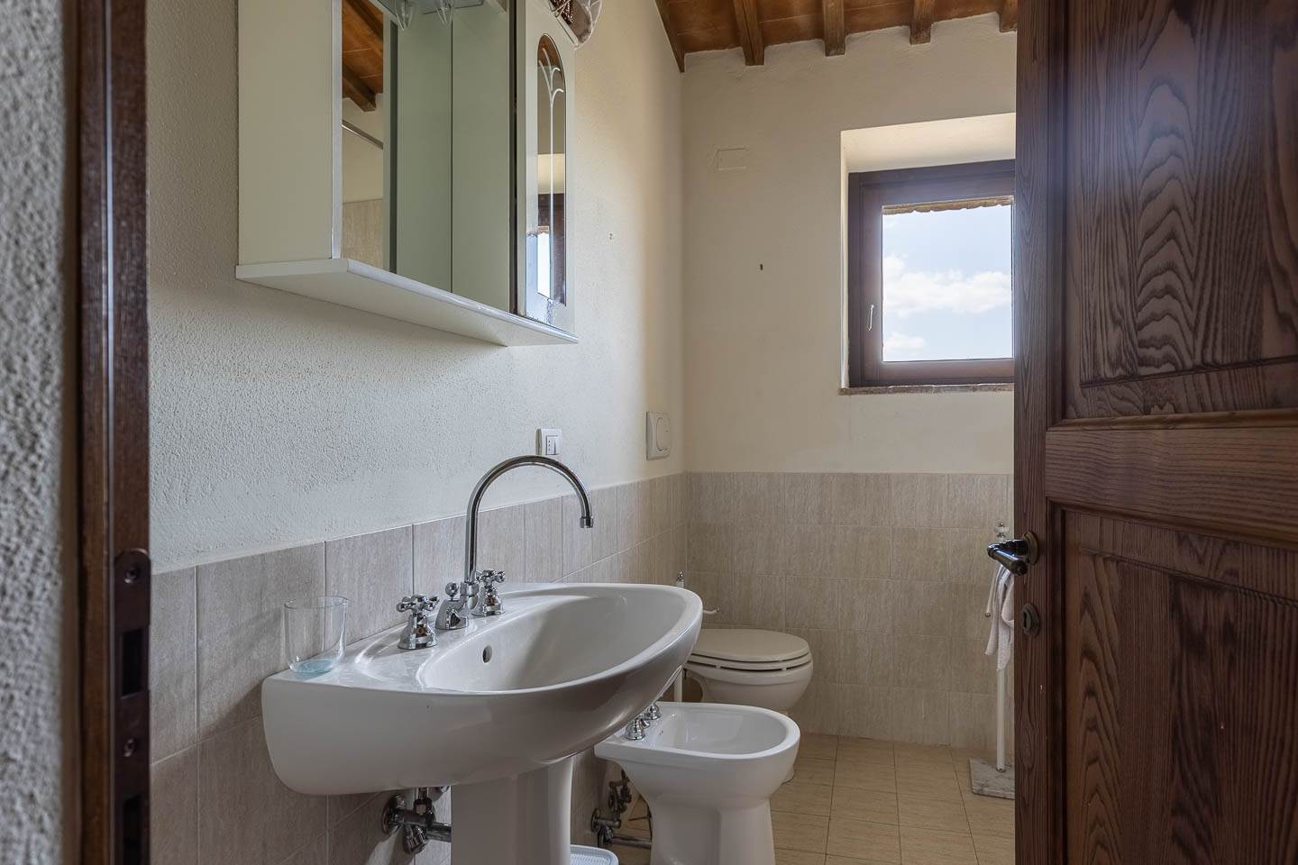 Rustico casale a Montalcino con 4 locali di 125 m2 - Foto